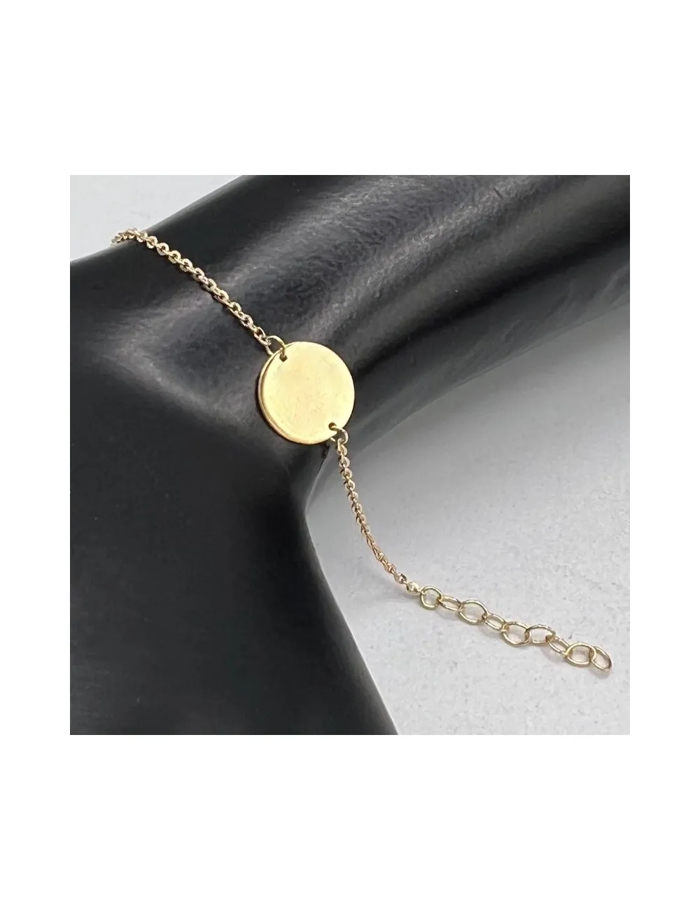 Bracciale e girocollo in oro giallo con dischetto